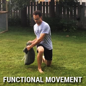 functional movement - rotational lunge with sandbag
